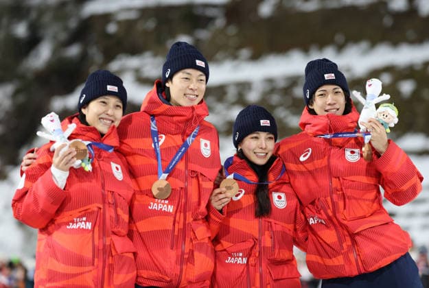 260210 -- PREDAZZO, Feb. 10, 2026 -- Bronze medalists Maruyama Nozomi, Kobayashi Ryoyu, Takanashi Sara and Nikaido Ren of Japan pose for a photo during the awarding ceremony of the Ski jumping, Skispringen, Ski, nordisch mixed team match at the Milan-Cortina 2026 Olympic Winter games, Winterspiele,Spiele, Summer games in Predazzo, Italy, Feb. 10, 2026. MICO2026ITALY-PREDAZZO-OLYMPIC WINTER GAMES-SKI JUMPING-MIXED TEAM HuangxWei  (MICO2026)ITALY-PREDAZZO-OLYMPIC WINTER GAMES-SKI JUMPING-MIXED TEAM IMAGO HuangxWei  imago images 0847274364
