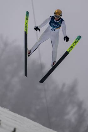 OLYMPICS - Winter Olympic Games, Olympische Spiele, Olympia, OS Milano Cortina 2026 PREDAZZO,ITALY,11.FEB.26 - OLYMPICS, NORDIC SKIING, NORDIC COMBINED, Ski jumping, Skispringen, Ski, nordisch - Winter Olympic Games Milano Cortina 2026, normal hill, men. Image shows Thomas Rettenegger (AUT).  GEPAxpictures xOliverxLerch