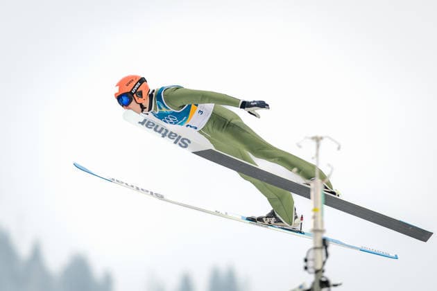 OLYMPICS - Winter Olympic Games, Olympische Spiele, Olympia, OS Milano Cortina 2026 PREDAZZO,ITALY,11.FEB.26 - OLYMPICS, NORDIC SKIING, NORDIC COMBINED, Ski jumping, Skispringen, Ski, nordisch - Winter Olympic Games Milano Cortina 2026, normal hill, men. Image shows Chingiz Rakparov (KAZ).  GEPAxpictures xMatthiasxTrinkl