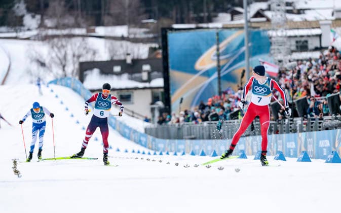 OLYMPICS - Winter Olympic Games, Olympische Spiele, Olympia, OS Milano Cortina 2026 TESERO,ITALY,11.FEB.26 - OLYMPICS, NORDIC SKIING, NORDIC COMBINED, CROSS COUNTRY - Winter Olympic Games Milano Cortina 2026, 10km Gundersen, men. Image shows Eero Hirvonen (FIN), Johannes Lamparter (AUT) and Jens Luraas Oftebro (NOR).  GEPAxpictures xMatthiasxTrinkl