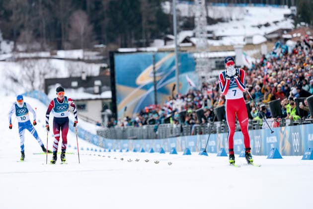 OLYMPICS - Winter Olympic Games, Olympische Spiele, Olympia, OS Milano Cortina 2026 TESERO,ITALY,11.FEB.26 - OLYMPICS, NORDIC SKIING, NORDIC COMBINED, CROSS COUNTRY - Winter Olympic Games Milano Cortina 2026, 10km Gundersen, men. Image shows Eero Hirvonen (FIN), Johannes Lamparter (AUT) and Jens Luraas Oftebro (NOR).  GEPAxpictures xMatthiasxTrinkl