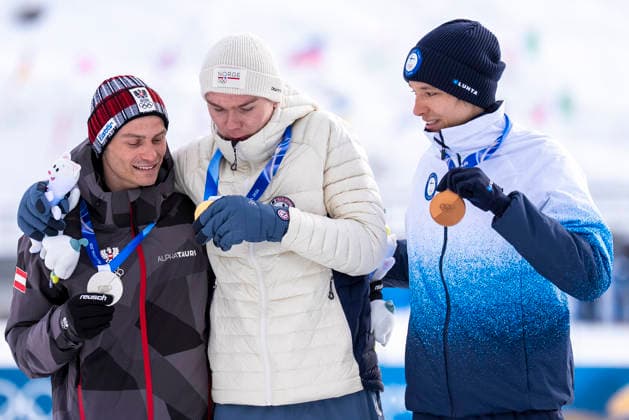 Nordic Combined - Milano Cortina 2026 Winter Olympics Day 5 Gold medalist Jens Luraas Oftebro of Team Norway, Silver medalist Johannes Lamparter of Team Austria and Bronze medalist Eero Hirvonen of Team Finland pose for a photo by taking a victory selfie on the podium during the medal ceremony for the Nordic Combined Individual Gundersen Normal Hill 10km on day five of the Milano Cortina 2026 Winter Olympic Games, Olympische Spiele, Olympia, OS at Tesero Cross-Country Stadium on February 11, 2026 in Val di Fiemme, Italy. Predazzo Italy  Copyright: xAndrzejxIwanczukx originalFilename:iwanczuk-nordicco260211_npo7Z.jpg