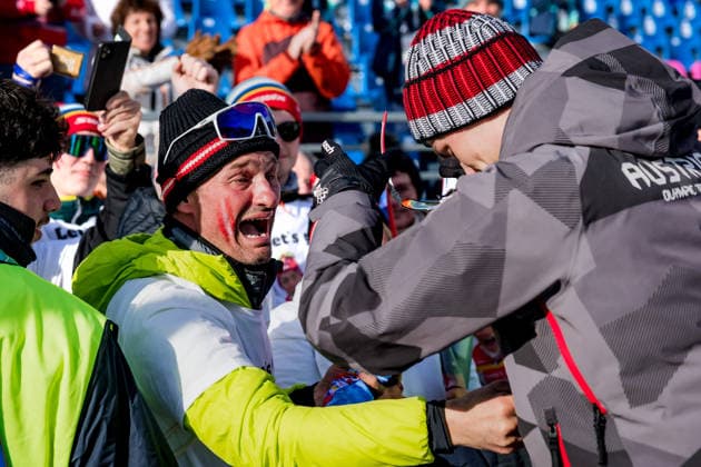 OLYMPICS - Winter Olympic Games, Olympische Spiele, Olympia, OS Milano Cortina 2026 TESERO,ITALY,11.FEB.26 - OLYMPICS, NORDIC SKIING, NORDIC COMBINED - Winter Olympic Games Milano Cortina 2026, normal hill, 10km Gundersen, men, medal ceremony. Image shows Johannes Lamparter (AUT) with his dad.  GEPAxpictures xMatthiasxTrinkl