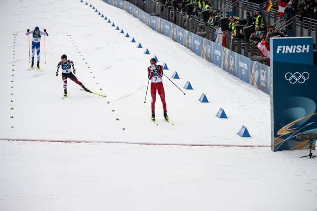 Zieleinlauf Johannes Lamparter ( Österreich ), Jens Luraas Oftebro ( Norwegen ) und Eero Hirvonen ( Finnland ), Nordic Combined Individual Men, Milano Cortina 2026 Olympic Games, Olympische Spiele, Olympia, OS 11-02-2026 *** Finish line Johannes Lamparter Austria , Jens Luraas Oftebro Norway and Eero Hirvonen Finland , Nordic Combined Individual Men, Milano Cortina 2026 Olympic Games 11 02 2026 Copyright: HMBxMedia MarcxNiemeyer
