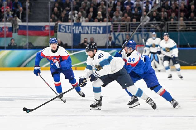 11 02 2026, Milano, Santa Giulia Ice hockey, Eishockey Arena, Winter Olympics: Slovakia - Finland (Ice Hockey), Joel Armia of Finland against Pavol Regenda of Slovakia Milano Santa Giulia Ice Hockey Arena Lombardy Italy *** 11 02 2026, Milano, Santa Giulia Ice Hockey Arena, Winter Olympics Slovakia Finland Ice Hockey , Joel Armia of Finland against Pavol Regenda of Slovakia Milano Santa Giulia Ice Hockey Arena Lombardy Italy Copyright: xJustPictures.ch AndreaxBrancax jp-en-AnBr-AB-AAB_214411022026