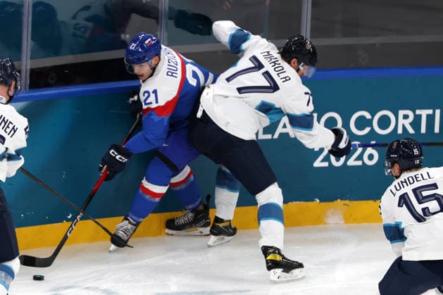 Milano Cortina 2026, Milan, Italy, 11.02, 2026, MiCo2026, MiCo, 2026, Olympics, Olympic, Winter Olympic, Olympic Winter games, Winterspiele,Spiele, Summer games Ice hockey, Eishockey Finland, Slovakia Adam Ruzicka of Slovakia and Niko Mikkola of Finland in action during Men™s Premilinary round Group B Ice Hockey match between Slovakia and Finland teams of Milano Cortina 2026 Olympic Winter Games in Milan, Italy, 11.02.2026. Photo: Roman Koksarov (RKF) Milan Italy Copyright: xRomanxKoksarovx 0B4A0130.JPG