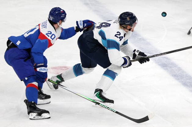 Milano Cortina 2026, Milan, Italy, 11.02, 2026, MiCo2026, MiCo, 2026, Olympics, Olympic, Winter Olympic, Olympic Winter games, Winterspiele,Spiele, Summer games Ice hockey, Eishockey Finland, Slovakia Juraj Slafkovsky of Slovakia and Roope Hintz of Finland in action during Men™s Premilinary round Group B Ice Hockey match between Slovakia and Finland teams of Milano Cortina 2026 Olympic Winter Games in Milan, Italy, 11.02.2026. Photo: Roman Koksarov (RKF) Milan Italy Copyright: xRomanxKoksarovx 0B4A0261.JPG