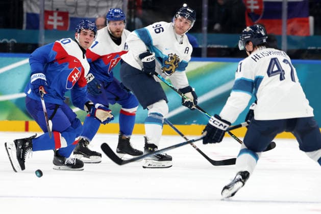 Milano Cortina 2026, Milan, Italy, 11.02, 2026, MiCo2026, MiCo, 2026, Olympics, Olympic, Winter Olympic, Olympic Winter games, Winterspiele,Spiele, Summer games Ice hockey, Eishockey Finland, Slovakia Juraj Slafkovsky of Slovakia and Mikko Rantanen of Finland in action during Men™s Premilinary round Group B Ice Hockey match between Slovakia and Finland teams of Milano Cortina 2026 Olympic Winter Games in Milan, Italy, 11.02.2026. Photo: Roman Koksarov (RKF) Milan Italy Copyright: xRomanxKoksarovx 0B4A0833.JPG