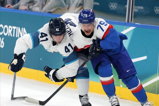 Milano Cortina 2026, Milan, Italy, 11.02, 2026, MiCo2026, MiCo, 2026, Olympics, Olympic, Winter Olympic, Olympic Winter games, Winterspiele,Spiele, Summer games Ice hockey, Eishockey Finland, Slovakia Miro Heiskanen of Finland and Libor Hudacek of Slovakia in action during Men™s Premilinary round Group B Ice Hockey match between Slovakia and Finland teams of Milano Cortina 2026 Olympic Winter Games in Milan, Italy, 11.02.2026. Photo: Roman Koksarov (RKF) Milan Italy Copyright: xRomanxKoksarovx 0B4A0859.JPG