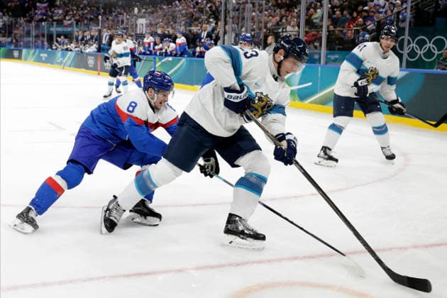 Milano Cortina 2026, Milan, Italy, 11.02, 2026, MiCo2026, MiCo, 2026, Olympics, Olympic, Winter Olympic, Olympic Winter games, Winterspiele,Spiele, Summer games Ice hockey, Eishockey Finland, Slovakia Esa Lindell of Finland and Oliver Okuliar of Slovakia in action during Men™s Premilinary round Group B Ice Hockey match between Slovakia and Finland teams of Milano Cortina 2026 Olympic Winter Games in Milan, Italy, 11.02.2026. Photo: Roman Koksarov (RKF) Milan Italy Copyright: xRomanxKoksarovx _23A2882.JPG