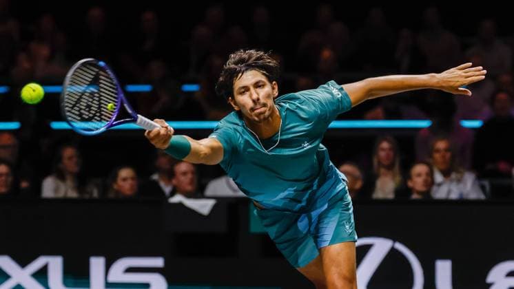 Alexei Popyrin in action against Felix Auger Aliassime ABN AMRO Open, Day Three, ABN AMRO Open, Rotterdam Ahoy, February 11, 2026, Rotterdam, Netherlands.