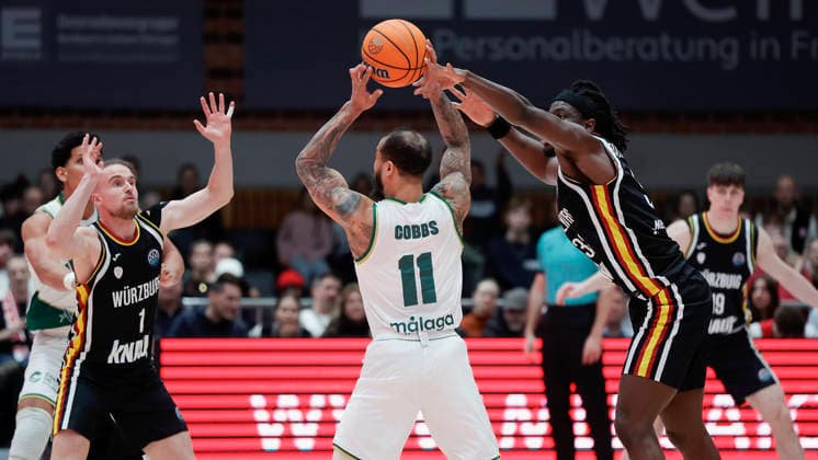 In the picture from left Lukas Herzog Wuerzburg Baskets, 1 , Justin Cobbs Unicaja Malaga, 11 and Charles Thompson Wuerzburg Baskets, 32 11 02 2026, Fitness First Wuerzburg Baskets vs Unicaja Malaga, Basketball Champions League, Round of 16, Group K, Matchday 4, Germany, 97072, tectake Arena Wuerzburg, Copyright: HMBxMedia xJulienxBecker