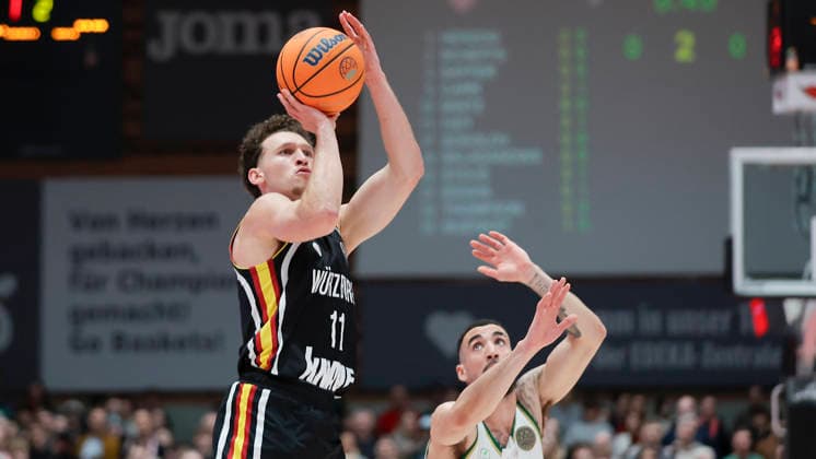 In the picture Brae Ivey Wuerzburg Baskets, 11 with the three-pointer 11 02 2026, Fitness First Wuerzburg Baskets vs Unicaja Malaga, Basketball Champions League, Round of 16, Group K, Matchday 4, Germany, 97072, tectake Arena Wuerzburg, Copyright: HMBxMedia xJulienxBecker