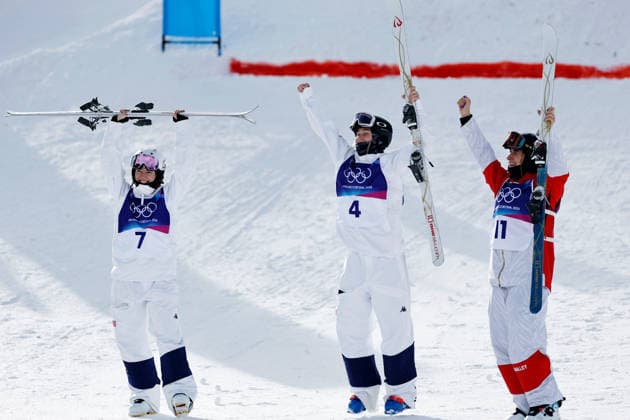 (260211) -- LIVIGNO, Feb. 11, 2026 -- Gold medalist Elizabeth Lemley (C) of the United States, silver medalist Jaelin Kauf (L) of the United States and bronze medalist Perrine Laffont of France celebrate after the freestyle skiing women s moguls final at the Milan-Cortina 2026 Olympic Winter games, Winterspiele,Spiele, Summer games in Livigno, Italy, Feb. 11, 2026. ) (MICO2026)ITALY-LIVIGNO-OLYMPIC WINTER GAMES-FREESTYLE SKIING WOMEN S MOGULS-FINAL WangxPeng 