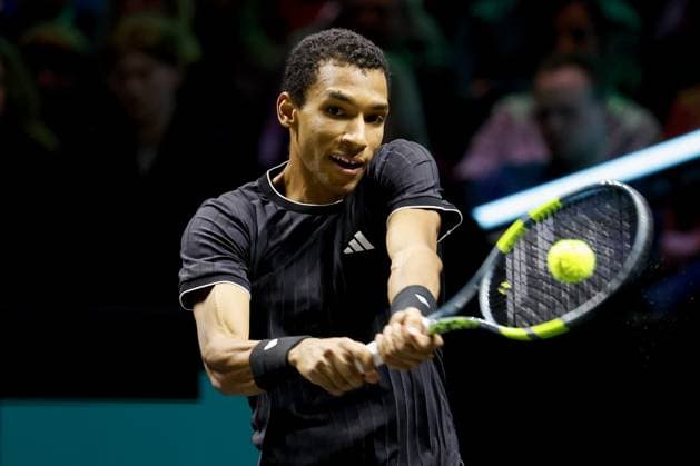 ROTTERDAM - FÃ lix Auger-Aliassime (Canada) in action against Alexei Popyri (Australia) on the third day of the ABN AMRO tennis tournament in Ahoy Rotterdam. BAS CZERWINSKI ANP xVIxANPxSportx xxANPxIVx 550373771 originalFilename: 550373771.jpg