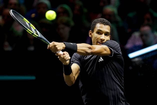 ROTTERDAM - FÃ lix Auger-Aliassime (Canada) in action against Alexei Popyri (Australia) on the third day of the ABN AMRO tennis tournament in Ahoy Rotterdam. BAS CZERWINSKI ANP xVIxANPxSportx xxANPxIVx 550373781 originalFilename: 550373781.jpg