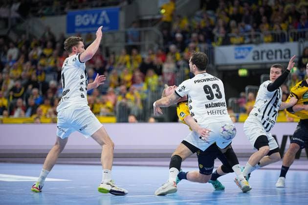 Scene with Magnus Landin 7 THW Kiel , Veron Nacinovic 93 THW Kiel , 17 THW Kiel and Patrick Groetzki 24 Rhein Neckar Löwen Rhein Neckar Löwen vs THW Kiel Copyright: xspeedshotx