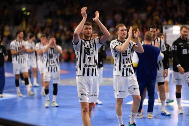 Scene with Magnus Landin 7 THW Kiel , Eric Johansson 21 THW Kiel and Petter Øverby 11 THW Kiel Rhein Neckar Löwen vs THW Kiel Copyright: xspeedshotx