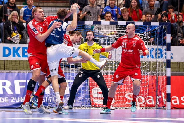 11 02 2026, Handball, 1 HBL, Bergischer HC MT Melsungen, Matchday 20, Uni Halle Wuppertal Dainis Kristopans Melsungen 10 and Olle Forsell Schefvert Melsungen 25 in a duel against Soeren Steinhaus BHC 53 next to Arnar Freyr Arnarsson Melsungen 21 North Rhine-Westphalia Germany