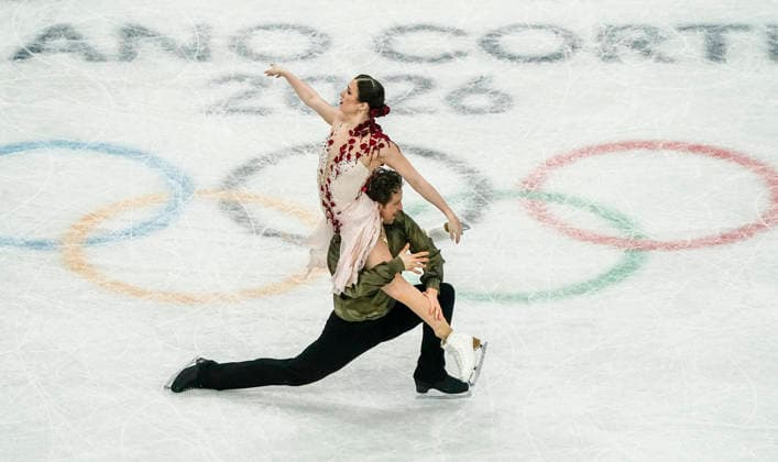 Christina Carreira and Anthony Ponomarenko of United States compete during the Ice Dance - Free Dance competition at the Milano Ice Skating Arena in Milan, Italy, on Wednesday, February 11, 2026.  OLY20260211516 RICHARDxELLIS