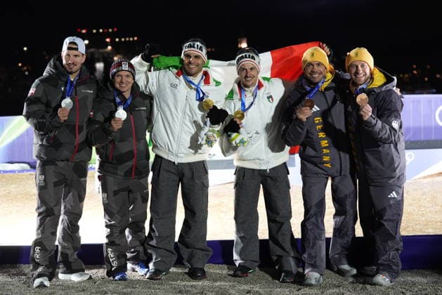 Italy s gold medalists Emanuel Rieder, Andrea Voetter, Marion Oberhofer and Simon Kainzwaldner, celebrate after the men s and women s doubles luge competitions at the 2026 Winter Olympics, in Cortina d Ampezzo, Italy, Wednesday, Feb. 11, 2026. (Photo Spada LaPresse)  Copyright: xSpada LaPressex