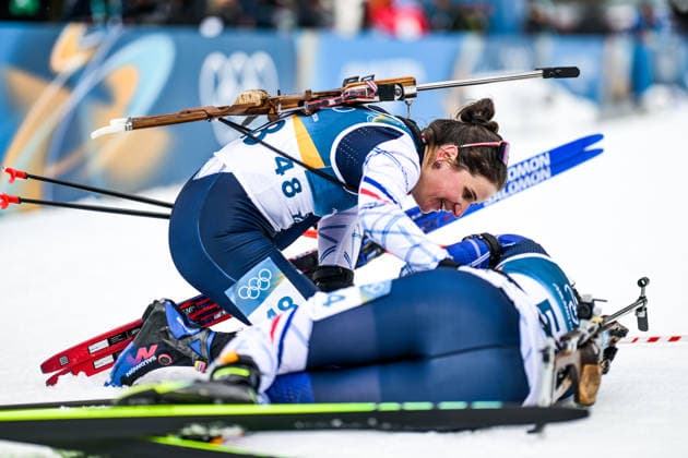 (260211) -- ANTERSELVA, Feb. 11, 2026 -- Julia Simon (L) of France celebrates with teammate Lou Jeanmonnot after the biathlon women s 15km individual match at the Milan-Cortina 2026 Olympic Winter games, Winterspiele,Spiele, Summer games in Anterselva, Italy, Feb. 11, 2026. ) (MICO2026)ITALY-ANTERSELVA-OLYMPIC WINTER GAMES-BIATHLON-WOMEN S 15KM INDIVIDUAL JiangxHan 