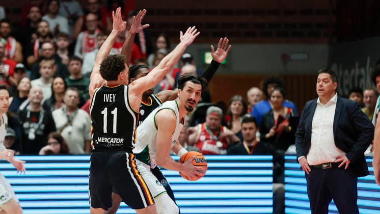 In the picture from left Brae Ivey Wuerzburg Baskets, 11 and Marcus Carr Wuerzburg Baskets, 5 defend Nihad Dedovic Unicaja Malaga, 14 11 02 2026, Fitness First Wuerzburg Baskets vs Unicaja Malaga, Basketball Champions League, Round of 16, Group K, Matchday 4, Germany, 97072, tectake Arena Wuerzburg, Copyright: HMBxMedia xJulienxBecker