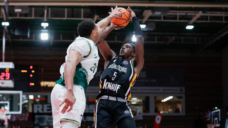 In the picture from left Augustine Rubit Unicaja Malaga, 21 against Marcus Carr Wuerzburg Baskets, 5 11 02 2026, Fitness First Wuerzburg Baskets vs Unicaja Malaga, Basketball Champions League, Round of 16, Group K, Matchday 4, Germany, 97072, tectake Arena Wuerzburg, Copyright: HMBxMedia xJulienxBecker