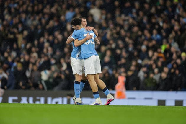 11th February 2026; Etihad Stadium, Manchester, Lancashire, England; Premier League Football, Manchester City versus Fulham; Rodri of Manchester City congratulates Nico O Reilly after scoring to make it 2-0 in the 30th minute  RogerxEvans Content restricted for UK based newspaper