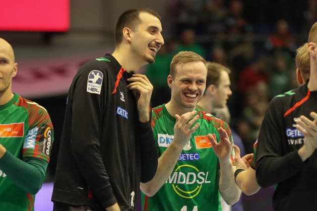 11 02 2026, xgox, Handball Daikin HBL SC Magdeburg TBV Lemgo Lippe emspor, f l Matej Mandic Magdeburg, 12 , Omar Ingi Magnusson Magdeburg, 14 Celebrating the victory, cheering after the end of the game Magdeburg