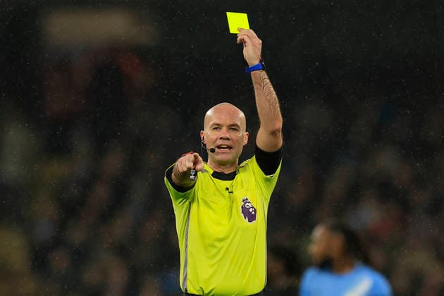 Manchester City v Fulham, Premier League Referee Paul Tierney issues a yellow card to Nico Gonzalez (14) of Manchester City during the Premier League match between Manchester City and Fulham at the Etihad Stadium, Manchester, UK on 11 February 2026. Manchester Etihad Stadium Manchester UK Editorial use only DataCo restrictions apply See www.football-dataco.com , Copyright: xConorxMolloyx PSI-23725-0058