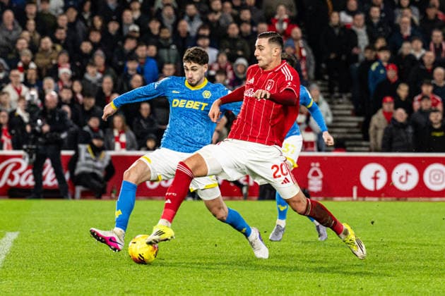 11th February 2026; The City Ground, Nottingham, England; Premier League Football, Nottingham Forest versus Wolverhampton Wanderers; Lorenzo Lucca of Nottingham Forest tries to connect with the ball ahead of Hugo Bueno of Wolverhampton Wanderers  GodfreyxPitt Content restricted for UK based newspaper