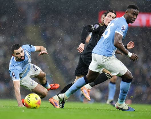 11th February 2026; Etihad Stadium, Manchester, Lancashire, England; Premier League Football, Manchester City versus Fulham; Rayan Ait-Nouri of Manchester City is brought down  RogerxEvans Content restricted for UK based newspaper