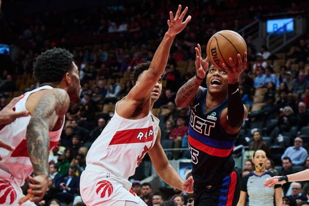 February 11, 2026, Toronto, On, Canada: Detroit Pistons Marcus Sasser (25) drives to the net past Toronto Raptors Trayce Jackson-Davis (32) during second half NBA, Basketball Herren, USA basketball action in Toronto, on Wednesday, Feb. 11, 2026. Canada News - February 11, 2026  - ZUMAc35_ 20260211_zaf_c35_306 Copyright: xSammyxKoganx