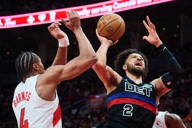 February 11, 2026, Toronto, On, Canada: Detroit Pistons Cade Cunningham (2) is stopped at the net by Toronto Raptors Scottie Barnes (4) during second half NBA, Basketball Herren, USA basketball action in Toronto, on Wednesday, Feb. 11, 2026. Canada News - February 11, 2026  - ZUMAc35_ 20260211_zaf_c35_308 Copyright: xSammyxKoganx