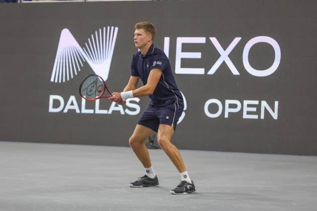 FRISCO, TX - FEBRUARY 11: Jenson Brooksby (USA) receives serve during the Nexo Dallas Open on February 11, 2026 at Ford Center at The Star in Frisco, TX. (Photo by George Walker Icon Sportswire) TENNIS: FEB 11 Dallas Open EDITORIAL USE ONLY Icon26021114