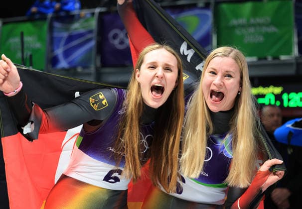 260211 -- CORTINA D AMPEZZO, Feb. 11, 2026 -- Magdalena Matschina L Dajana Eitberger of Germany celebrate after the luge women s doubles run 1 at the Milan-Cortina 2026 Olympic Winter games, Winterspiele,Spiele, Summer games in Cortina, Italy, Feb. 11, 2026. MICO2026ITALY-CORTINA D AMPEZZO-OLYMPIC WINTER GAMES-LUGE-WOMEN S DOUBLES DingxXu  (MICO2026)ITALY-CORTINA D AMPEZZO-OLYMPIC WINTER GAMES-LUGE-WOMEN S DOUBLES IMAGO DingxXu  imago images 0847355844