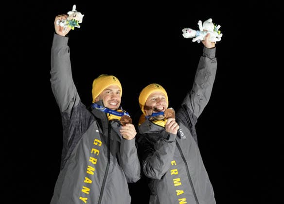 260211 -- CORTINA D AMPEZZO, Feb. 11, 2026 -- Bronze medalists Tobias Wendl Tobias Arlt of Germany pose for a photo during the awarding ceremony of the luge men s doubles at the Milan-Cortina 2026 Olympic Winter games, Winterspiele,Spiele, Summer games in Cortina, Italy, Feb. 11, 2026. MICO2026ITALY-CORTINA D AMPEZZO-OLYMPIC WINTER GAMES-LUGE-MEN S DOUBLES LixGang  (MICO2026)ITALY-CORTINA D AMPEZZO-OLYMPIC WINTER GAMES-LUGE-MEN S DOUBLES IMAGO LixGang  imago images 0847357005