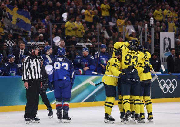 (260212) -- MILAN, Feb. 12, 2026 -- Players of Sweden celebrate a goal during the Ice hockey, Eishockey men s preliminary round group B match between Italy and Sweden at the Milan-Cortina 2026 Olympic Winter games, Winterspiele,Spiele, Summer games in Milan, Italy, Feb. 11, 2026. ) (MICO2026)ITALY-MILAN-OLYMPIC WINTER GAMES-ICE HOCKEY-MEN-PRELIMINARY-ITA VS SWE WangxKaiyan 