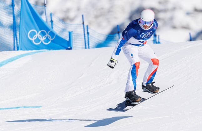 OLYMPICS - Winter Olympic Games, Olympische Spiele, Olympia, OS Milano Cortina 2026 LIVIGNO,ITALY,12.FEB.26 - OLYMPICS, SNOWBOARD - Winter Olympic Games Milano Cortina 2026, Snowboard Cross, men, qualification. Image shows Merlin Surget (FRA).  GEPAxpictures xHaraldxSteiner