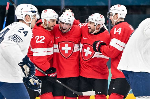 MILAN, ITALY - FEBRUARY 12: Damien Riat of Switzerland C) celebrate his goal with Nino Niederreiter of Switzerland L), Sven Andrighetto of Switzerland R) and Dean Kukan of Switzerland R) on day six of the Milano Cortina 2026 Winter Olympic Games, Olympische Spiele, Olympia, OS at Milano Santagiulia Ice hockey, Eishockey Arena on February 12, 2026 in Milan, Italy. Milan Milano Rho Ice Hockey Arena Italy *** MILAN, ITALY FEBRUARY 12 Damien Riat of Switzerland C celebrate his goal with Nino Niederreiter of Switzerland L , Sven Andrighetto of Switzerland R and Dean Kukan of Switzerland R on day six of the Milano Cortina 2026 Winter Olympic games at Milano Santagiulia Ice Hockey Arena on February 12, 2026 in Milan, Italy Milan Milano Rho Ice Hockey Arena Italy Copyright: xJustPictures.ch AndreaxBrancax jp-en-EuSpIm-AB-AAB_546812022026