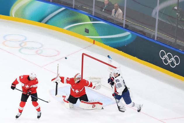 February 12, 2026, Milan, Lombardy, Italy: Goalie LEONARDO GENONI 63 of Team Switzerland makes a save in the Men s Preliminary Round Group A game between Team Switzerland (SUI) and Team France (FRA) at the Milano Cortina 2026 Winter Olympic Games, Olympische Spiele, Olympia, OS Milan Italy - ZUMAc179 20260212_oly_c179_013 Copyright: xMickaelxChavetx