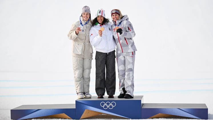 OLYMPICS - Winter Olympic Games, Olympische Spiele, Olympia, OS Milano Cortina 2026 CORTINA D AMPEZZO,ITALY,12.FEB.26 - OLYMPICS, ALPINE SKIING - Winter Olympic Games Milano Cortina 2026, Super G, women, medal ceremony. Image shows the rejoicing of Romane Miradoli (FRA), Federica Brignone (ITA) and Cornelia Huetter (AUT). Keywords: medal.  GEPAxpictures xAlexanderxSolc