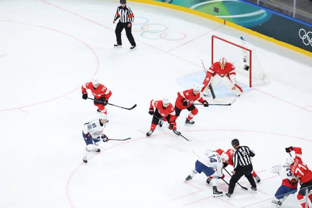 February 12, 2026, Milan, Lombardy, Italy: Men s Preliminary Round Group A game between Team Switzerland (SUI) and Team France (FRA) at the Milano Cortina 2026 Winter Olympic Games, Olympische Spiele, Olympia, OS Milan Italy - ZUMAc179 20260212_oly_c179_019 Copyright: xMickaelxChavetx
