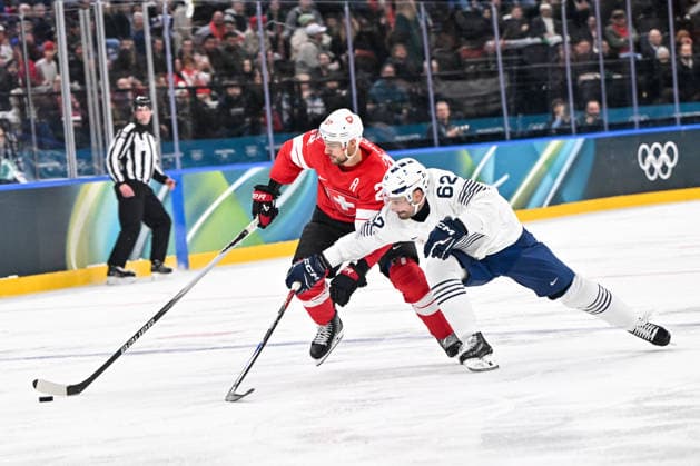 MILAN, ITALY - FEBRUARY 12: Nino Niederreiter of Switzerland L) protects the puck from Florian Chakiachvili of France R) on day six of the Milano Cortina 2026 Winter Olympic Games, Olympische Spiele, Olympia, OS at Milano Santagiulia Ice hockey, Eishockey Arena on February 12, 2026 in Milan, Italy. Milan Milano Rho Ice Hockey Arena Italy *** MILAN, ITALY FEBRUARY 12 Nino Niederreiter of Switzerland L protects the puck from Florian Chakiachvili of France R on day six of the Milano Cortina 2026 Winter Olympic games at Milano Santagiulia Ice Hockey Arena on February 12, 2026 in Milan, Italy Milan Milano Rho Ice Hockey Arena Italy Copyright: xJustPictures.ch AndreaxBrancax jp-en-EuSpIm-AB-AAB_657512022026