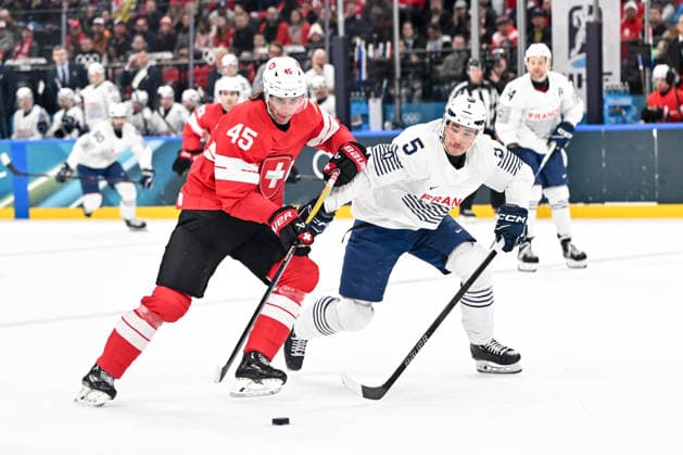 MILAN, ITALY - FEBRUARY 12: Michael Fora of Switzerland in action against Enzo Guebey of France on day six of the Milano Cortina 2026 Winter Olympic Games, Olympische Spiele, Olympia, OS at Milano Santagiulia Ice hockey, Eishockey Arena on February 12, 2026 in Milan, Italy. Milan Milano Rho Ice Hockey Arena Italy *** MILAN, ITALY FEBRUARY 12 Michael Fora of Switzerland in action against Enzo Guebey of France on day six of the Milano Cortina 2026 Winter Olympic games at Milano Santagiulia Ice Hockey Arena on February 12, 2026 in Milan, Italy Milan Milano Rho Ice Hockey Arena Italy Copyright: xJustPictures.ch AndreaxBrancax jp-en-EuSpIm-AB-AAB_692512022026