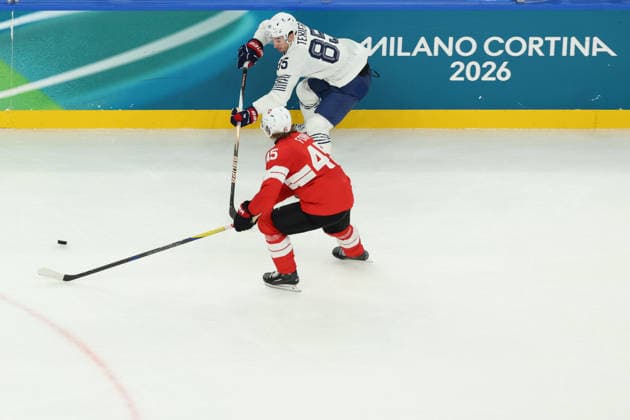 February 12, 2026, Milan, Lombardy, Italy: MICHAEL FORA 45 of Switzerland and ALEXANDRE TEXIER 85 of France in the Men s Preliminary Round Group A game between Team Switzerland (SUI) and Team France (FRA) at the Milano Cortina 2026 Winter Olympic Games, Olympische Spiele, Olympia, OS Milan Italy - ZUMAc179 20260212_oly_c179_032 Copyright: xMickaelxChavetx