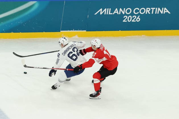 February 12, 2026, Milan, Lombardy, Italy: KEN JAGER 17 of Switzerland and FLORIAN .CHAKIACHVILI 62 of France fight for the puck in the Men s Preliminary Round Group A game between Team Switzerland (SUI) and Team France (FRA) at the Milano Cortina 2026 Winter Olympic Games, Olympische Spiele, Olympia, OS Olympics 2026: Milano Cortina: Ice hockey, Eishockey Men S: SUI:FRA  - ZUMAc179 20260212_oly_c179_028 Copyright: xMickaelxChavetx