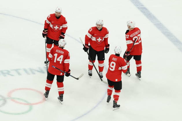 February 12, 2026, Milan, Lombardy, Italy: TEAM SWITZERLAND PLAYERS react in the Men s Preliminary Round Group A game between Team Switzerland (SUI) and Team France (FRA) at the Milano Cortina 2026 Winter Olympic Games, Olympische Spiele, Olympia, OS Olympics 2026: Milano Cortina: Ice hockey, Eishockey Men S: SUI:FRA  - ZUMAc179 20260212_oly_c179_031 Copyright: xMickaelxChavetx