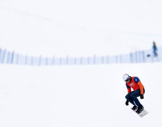 LIVIGNO - Snowboarder Glenn de Blois during the round of 16 of the cross-country event at the Milan Winter Olympics. IRIS VAN DEN BROEK ANP xVIxANPxSportx xxANPxIVx 550450517 originalFilename: 550450517.jpg